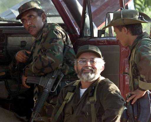 Milton Toncel Redondo, alias Joaquín Gómez (izq., junto a Raúl Reyes): jefe del Bloque Central y encargado de manejar los ingresos del narcotráfico, según las autoridades. AP