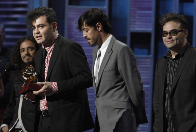 Cafe Tacuba accepts the best alternative song award at the 9th annual Latin Grammy Awards on Thursday, Nov. 13, 2008 in Houston. Matt Sayles / AP 